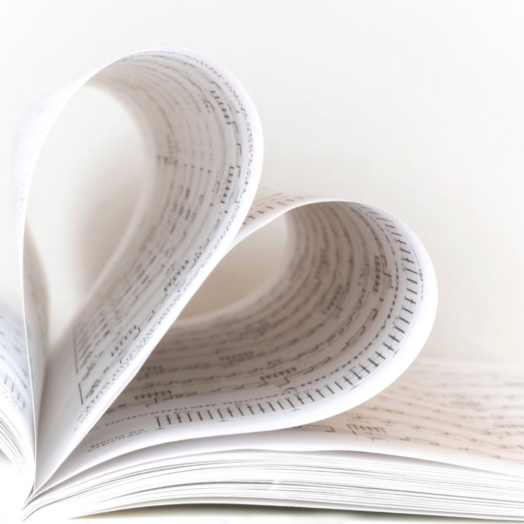 Sheets of musical notes in the form of a heart